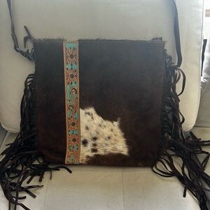 Cow hide/leather with turquoise accents